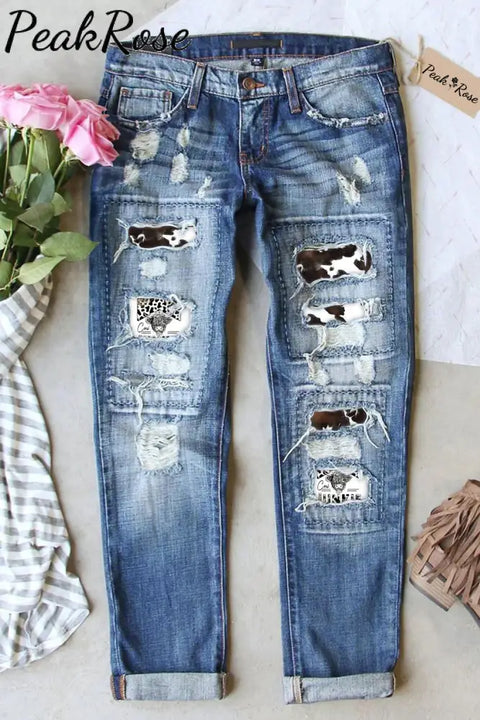 Cow Junkie Print Ripped Denim Jeans