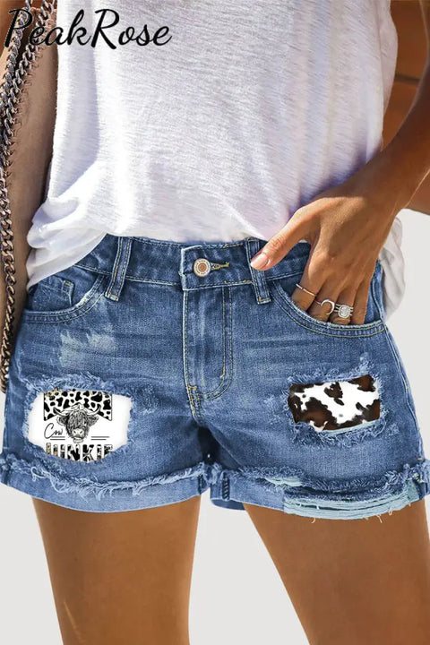 Cow Junkie Print Ripped Denim Shorts