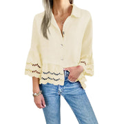 Solid Lapel Flared Sleeve Cutout Hem Blouse