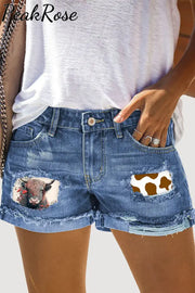 Western Cow Print Ripped Denim Shorts